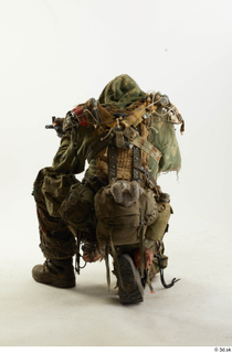 Photos John Hopkins Army Postapocalyptic Suit Poses aiming the gun…